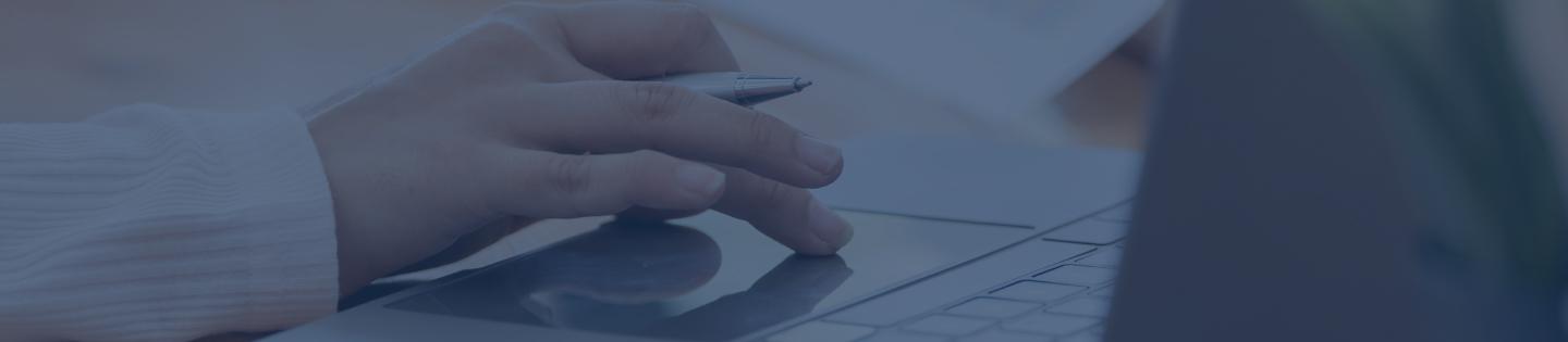 A hand on a trackpad